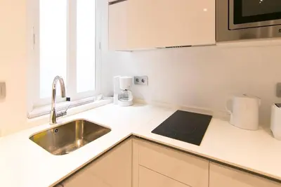 Una cocina o zona de cocina en En el Corazón de Madrid, Museos