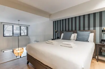 Cama o camas de una habitación en LAUREL-MintyStay Apartments