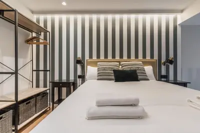 Cama o camas de una habitación en LAUREL-MintyStay Apartments