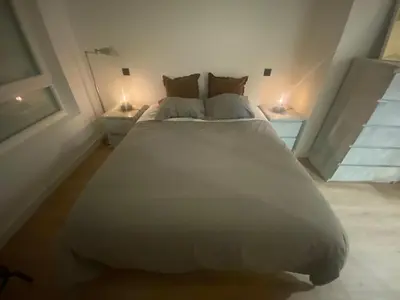 Cama o camas de una habitación en Confort al lado del río