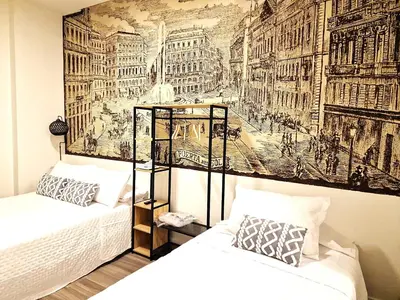Cama o camas de una habitación en Madrid suites 3