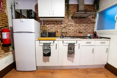 Una cocina o zona de cocina en Apartamento Forum