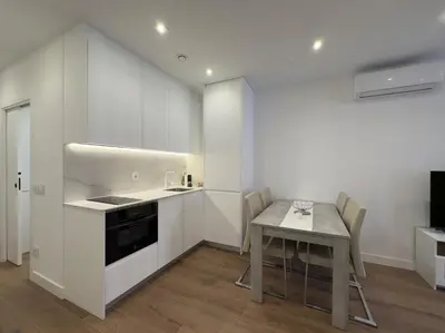 Una cocina o zona de cocina en Apartamentos ALFISA Puerta del Sol