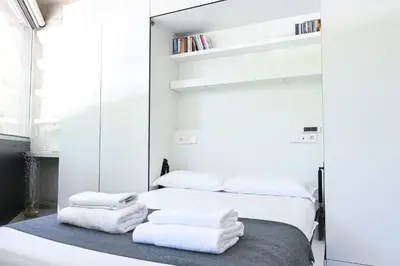 Cama o camas de una habitación en For You Rentals Espectacular apartamento TEMPORAL en Madrid Río VAL100