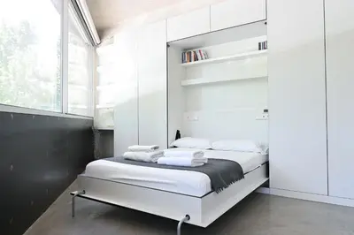 Cama o camas de una habitación en For You Rentals Espectacular apartamento TEMPORAL en Madrid Río VAL100