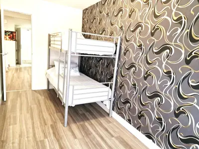 Cama o camas de una habitación en Madrid Suites