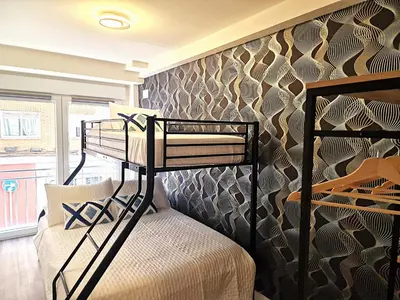 Cama o camas de una habitación en Madrid Suites