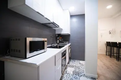 Una cocina o zona de cocina en Smartliving Madrid Centro