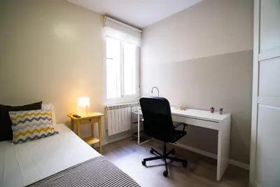 Cama o camas de una habitación en Smartliving Madrid Centro