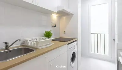 Una cocina o zona de cocina en Smartliving Madrid Sur