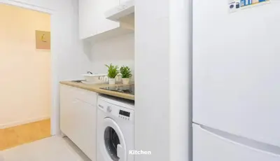 Una cocina o zona de cocina en Smartliving Madrid Sur