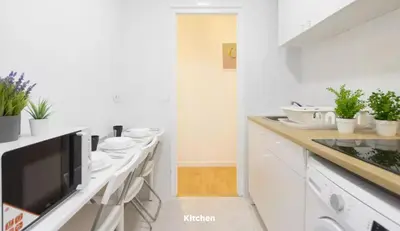 Una cocina o zona de cocina en Smartliving Madrid Sur