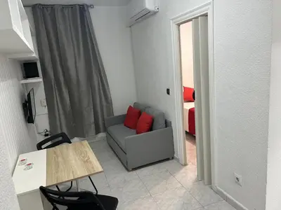 Zona de estar de Una encantadora estancia en el centro Madrid