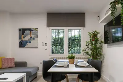 Zona de estar de Apartamento Bronce by Clabao