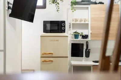 Una cocina o zona de cocina en Estudio privado y tranquilo Plaza de España