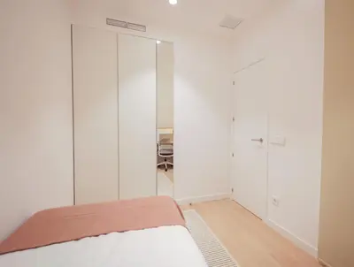 Cama o camas de una habitación en Delightful 2BR Flat in Chic Chueca