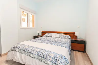 Cama o camas de una habitación en Increible apartamento reformado en el Brooklyn Madrileño