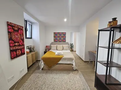 Cama o camas de una habitación en The Gabriels Chamberí