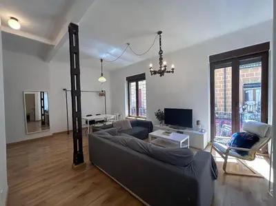 Una televisión o centro de entretenimiento en Stunning apartment for 7 pax - CvB