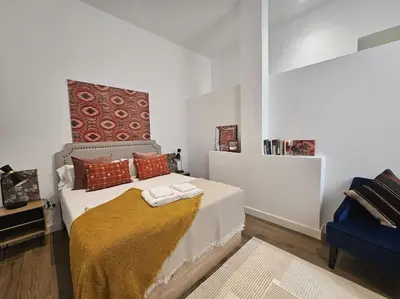 Cama o camas de una habitación en The Gabriels con terraza