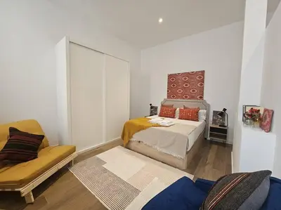 Cama o camas de una habitación en The Gabriels con terraza