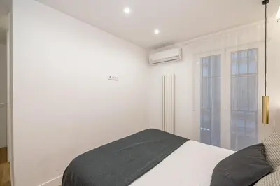 Cama o camas de una habitación en Chueca VIII calle Hortaleza 3BR 3BH