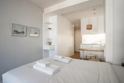 Cama o camas de una habitación en Cozy studio-Chamberí