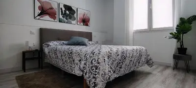 Cama o camas de una habitación en Luxury two bedrooms Madrid downtown