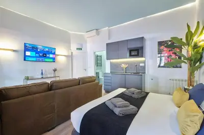 Una televisión o centro de entretenimiento en ºRS CityCentre DownTown WiFi AC SmartTVº