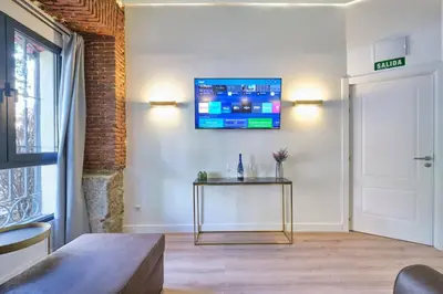 Una televisión o centro de entretenimiento en ºRS CityCentre DownTown WiFi AC SmartTVº