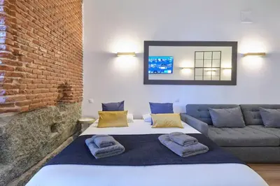 Cama o camas de una habitación en ººººRS CityCentre DownTown WiFi AC SmartTVºººº