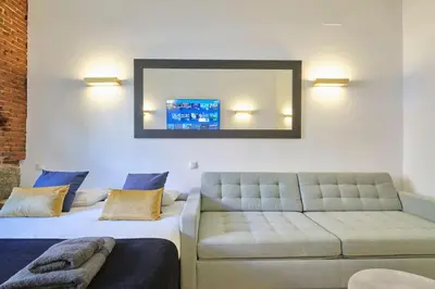Cama o camas de una habitación en ººRS CityCentre DownTown WiFi AC SmartTVºº