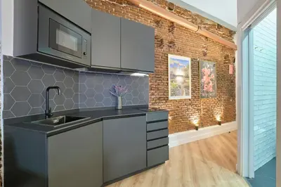 Una cocina o zona de cocina en ºººººRS CityCentre DownTown WiFi AC SmartTVººººº