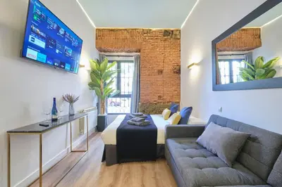 Una televisión o centro de entretenimiento en ºººRS CityCentre DownTown WiFi AC SmartTVººº