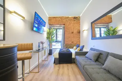 Zona de estar de ºººRS CityCentre DownTown WiFi AC SmartTVººº
