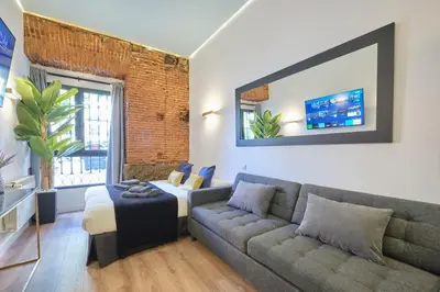 Una televisión o centro de entretenimiento en ºººRS CityCentre DownTown WiFi AC SmartTVººº