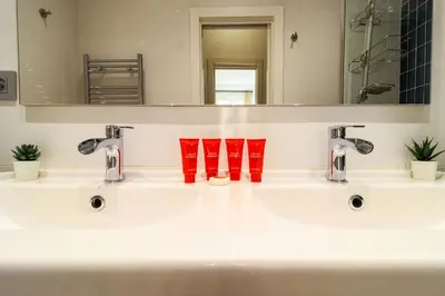 Un baño de Chamberi Boutique