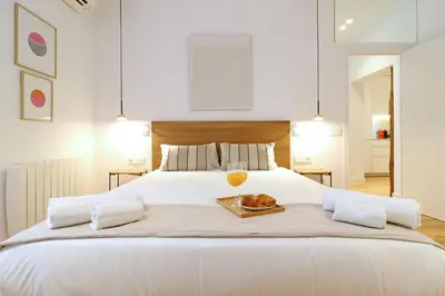 Cama o camas de una habitación en Justicia Centric