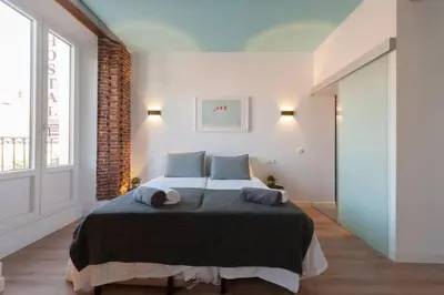 Cama o camas de una habitación en ººººPS New Atocha City Centre WiFi AC SmartTVºººº