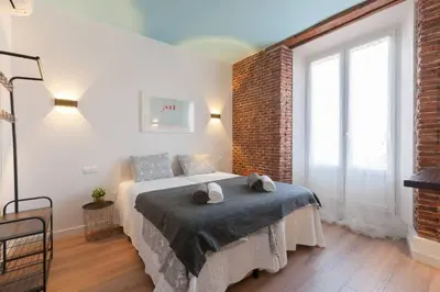 Cama o camas de una habitación en ºººººPS New Atocha City Centre WiFi AC SmartTVººººº