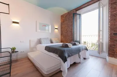 Cama o camas de una habitación en ºººººPS New Atocha City Centre WiFi AC SmartTVººººº