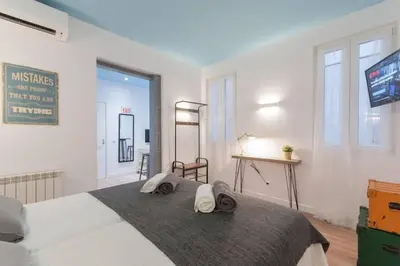Cama o camas de una habitación en ººººººPS New Atocha City Centre WiFi AC SmartTVºººººº