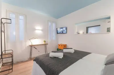 Cama o camas de una habitación en ººººººPS New Atocha City Centre WiFi AC SmartTVºººººº