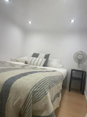 Cama o camas de una habitación en Apartamento en pleno centro de Madrid