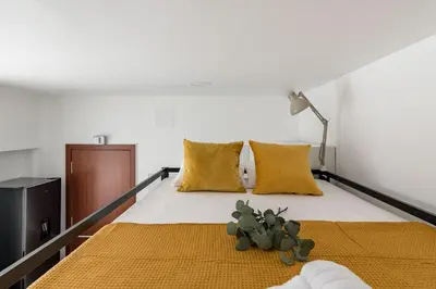 Cama o camas de una habitación en Charming Urban Madrid I y II