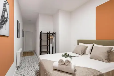 Cama o camas de una habitación en Charming Urban Madrid I y II