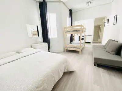 Cama o camas de una habitación en LV5F Estúdio Madrid Centro Chamberi