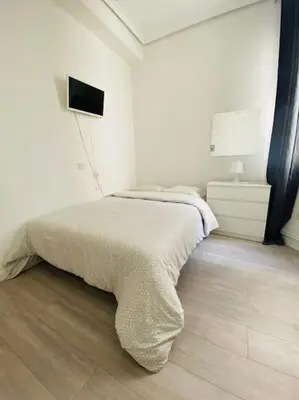 Cama o camas de una habitación en LV5F Estúdio Madrid Centro Chamberi