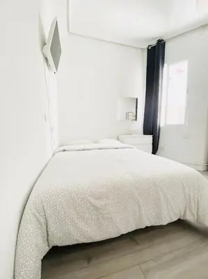 Cama o camas de una habitación en LV5F Estúdio Madrid Centro Chamberi