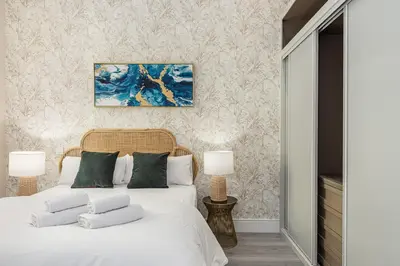 Cama o camas de una habitación en Waou Glam Plaza España